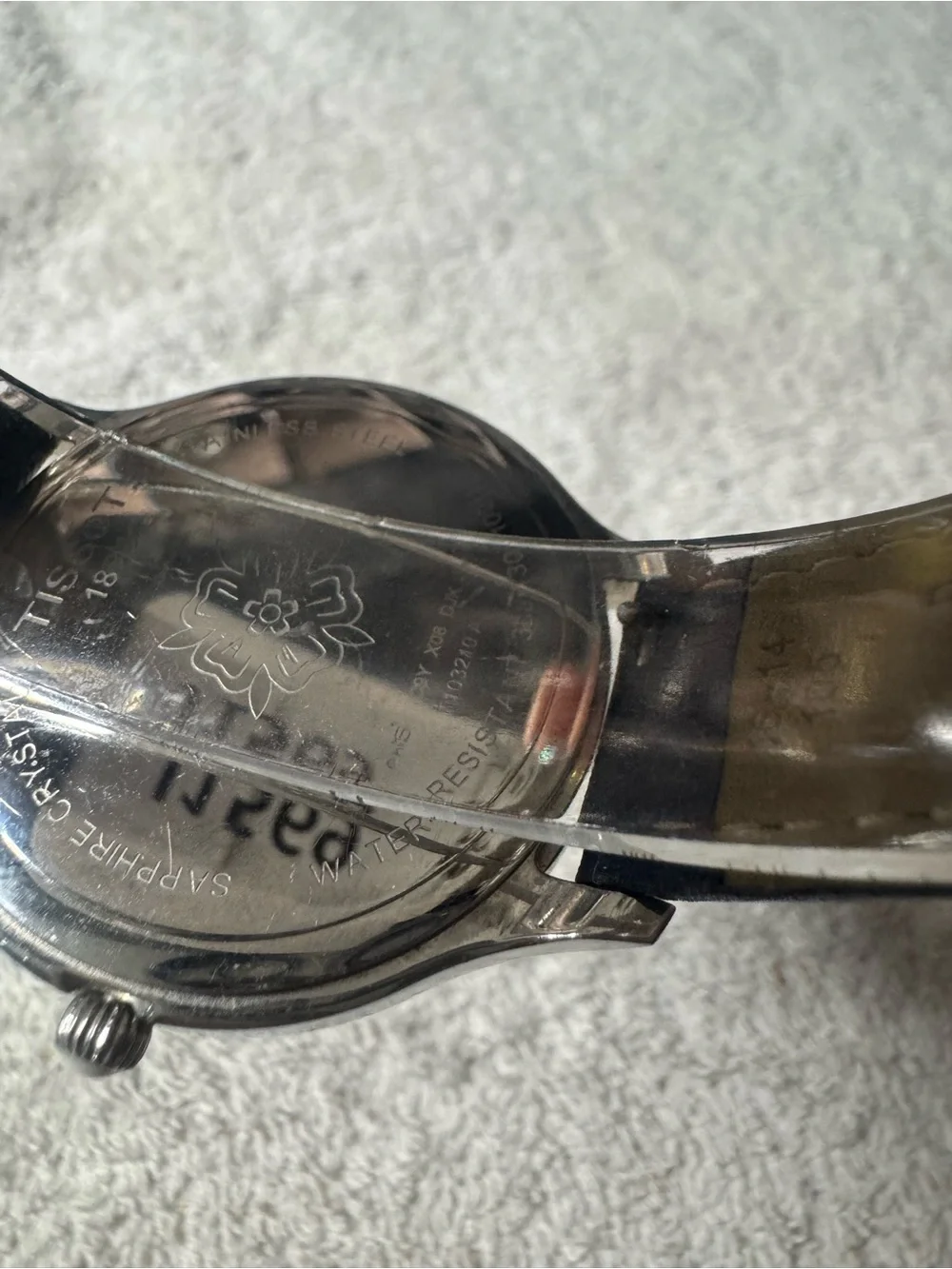 Tissot Watch with Black Leather Strap and Silver Clasp